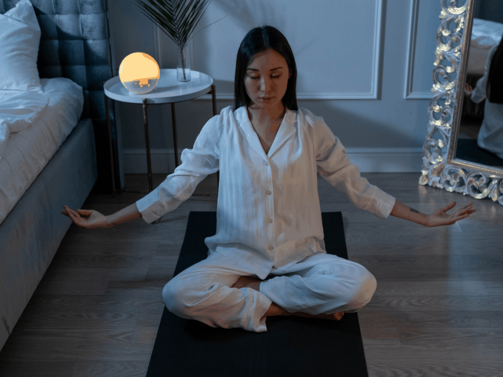 Woman meditating before going to sleep in Bankstown 